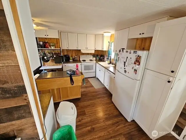 Lots of cupboards and appliances all stay.