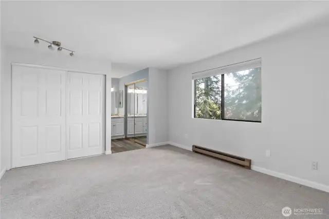 Primary bedroom. All new carpets, doors, trim, and updated ensuite.
