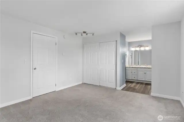 Primary bedroom. See 360 walkthrough video and interactive floorplans on the virtual tour link.