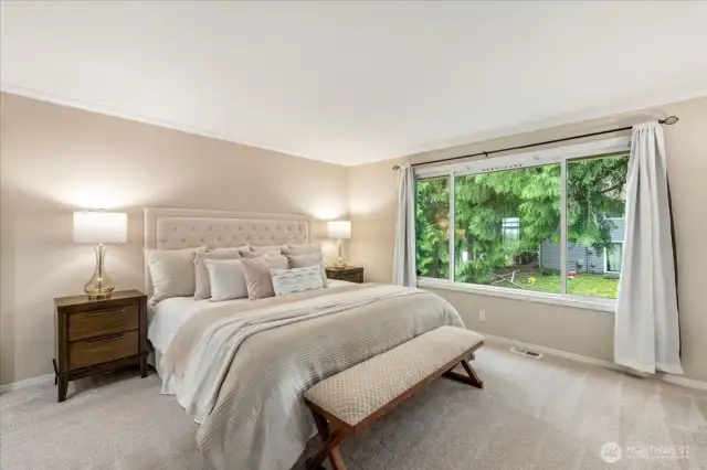 The primary bedroom is a relaxing retreat at the end of the day