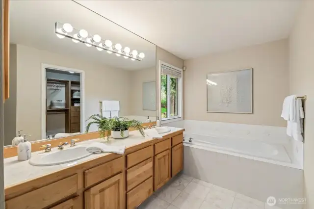 Primary en-suite with double sinks, soaking tub and walk in shower