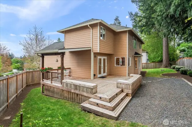 Another view of the deck and backyard