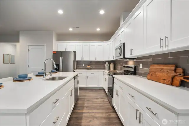 Photos are of Juniper model home. Colors and features will vary.