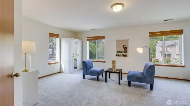 Step into this adaptable fourth bedroom—ideal for transforming into a peaceful sanctuary, a creative play space, or whatever best fits your needs