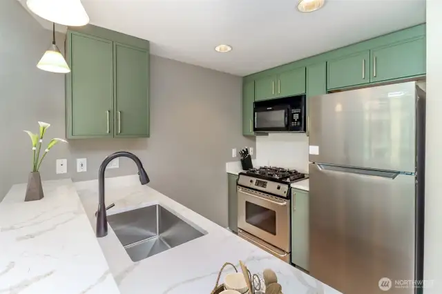 Kitchen - Image is virtually staged.