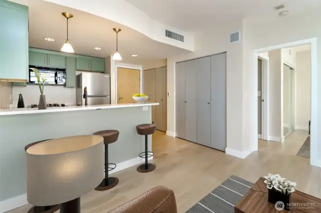 Kitchen bar stools, dining area - Image is virtually staged.