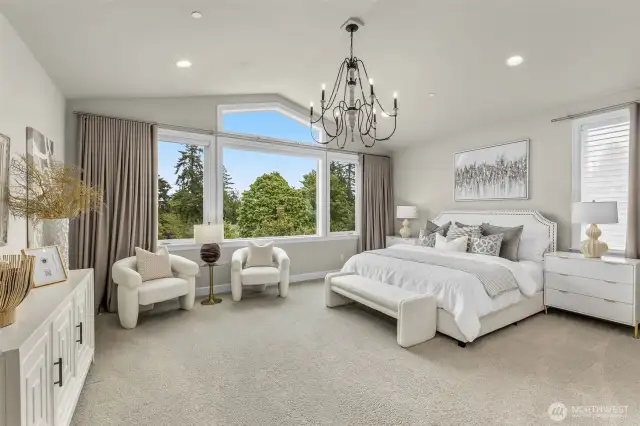 The primary suite offers breathtaking Cascade views