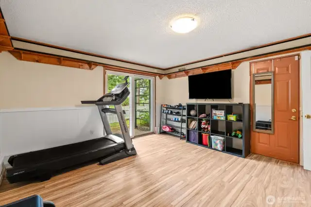 Sliding glass door and door to attached garage.