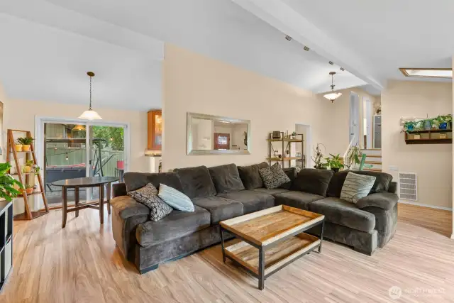 Living room open to dining room.