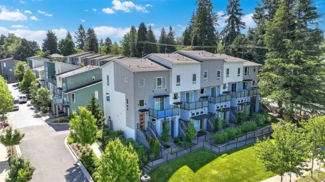 The home is located in the first building, 2nd from the end.  This 5-unit building was built with a very special benefit.  The street level portion has a special entrance that allows for you to conduct a business.  There is a separate entrance, a ready to finish half bath and close by parking.