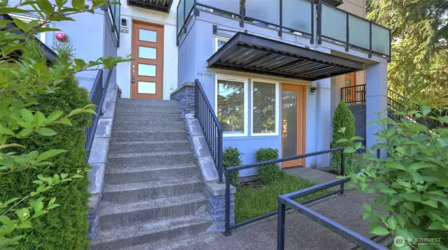 This is the front of the home.  14528 is the home address.  The door to the potential business is on the right.  The overhanging deck is above with a view of the local area.