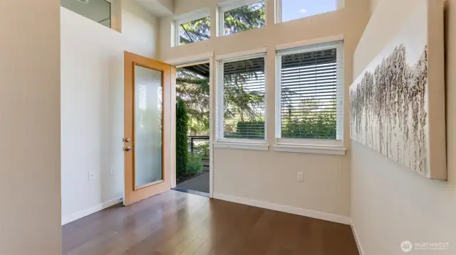 The special room has wonderful natural light and a high ceiling.  This room is yours and does not need to be used for a business.  It could be a work out room, a media room or a hobby room.