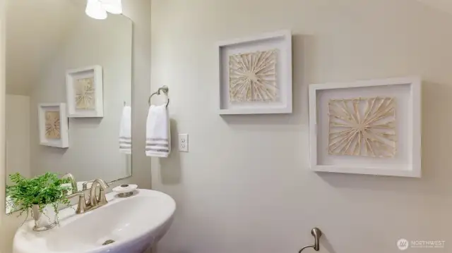 There is a convenient powder room on the condominium main floor.