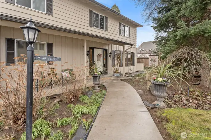 inviting entry with quaint covered porch