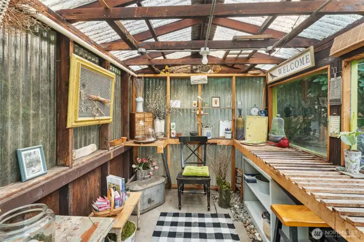 inside eclectic potting shed in rear yard