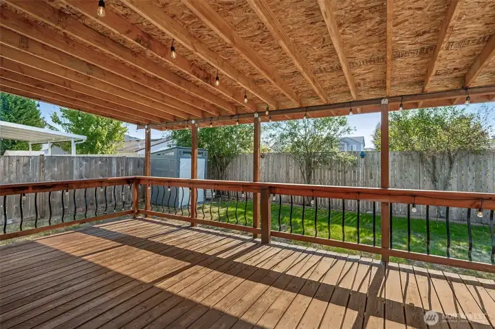 Large covered deck in the backyard