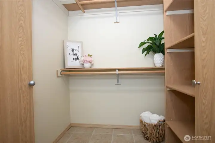 Spacious walk-in closet with plenty of storage