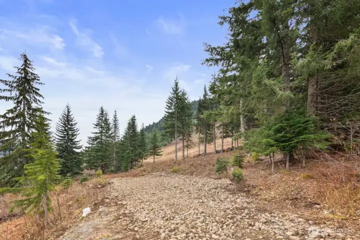 This double lot sits at the very top of a quiet cul-de-sac—Hyak’s highest elevation point.