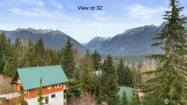 At thirty-two feet, on your upper floor, the mountains truly unfold. From here, the view soars all the way toward the iconic Chikamin Peak. It’s an elevated vantage rarely found on Snoqualmie Pass—wide, sweeping, and completely unobstructed. Perfect for a primary suite, a loft, or any space meant to inspire.