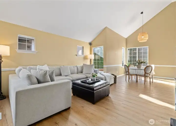 Vaulted ceilings in the formal living and dining space