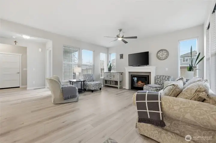 Nice and bright living room with luxury vinyl plank flooring.