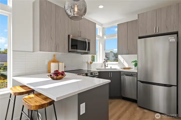 Photos of similar unit to showcase floor plan and quality.