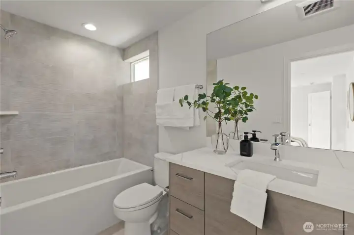 Photos of similar unit to showcase floor plan and quality.