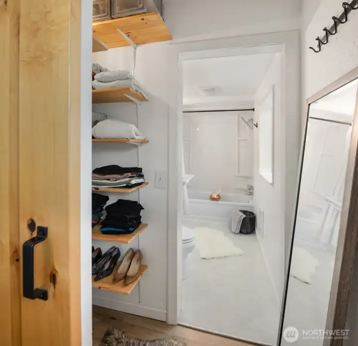 Closet off primary bedroom as you head into the primary bath.