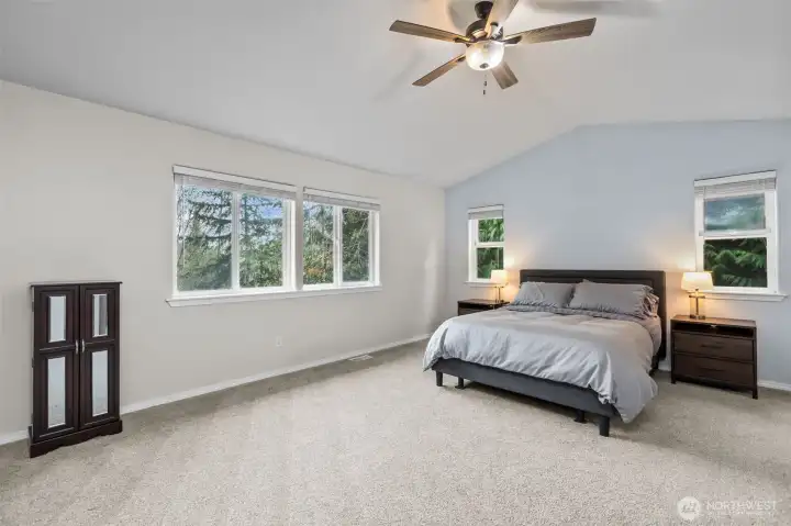 Spacious primary suite with peaceful views.