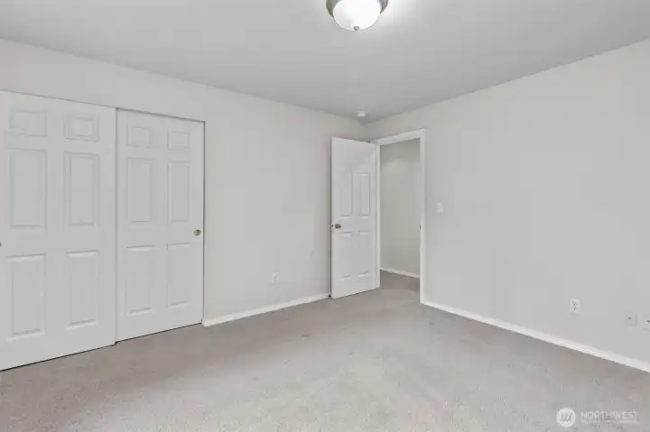 Bedroom #3, located on the lower floor.