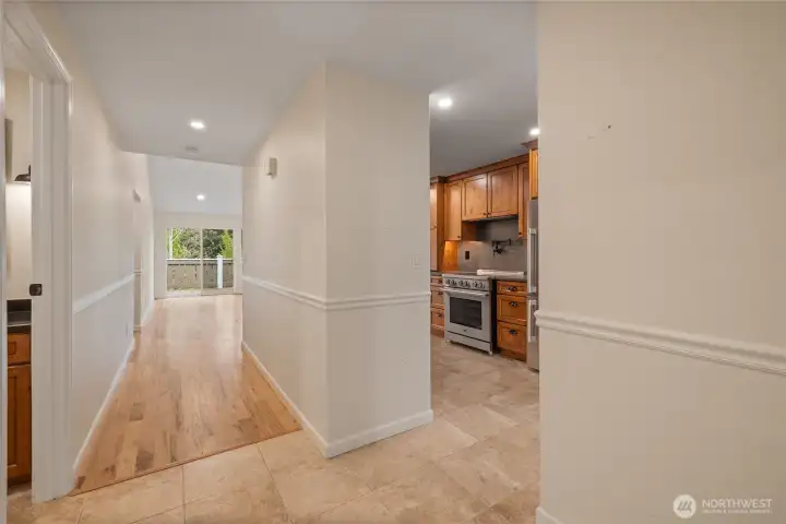 Walking in the front door on the brand new flooring