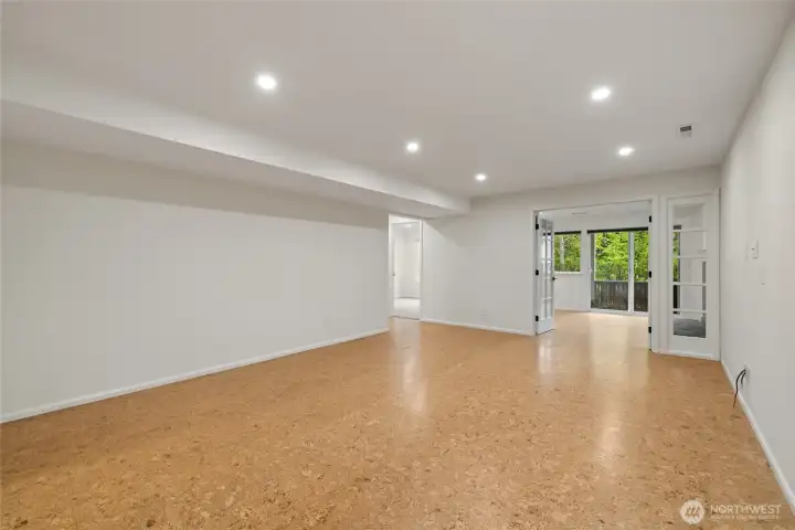 Downstairs family room has cork flooring