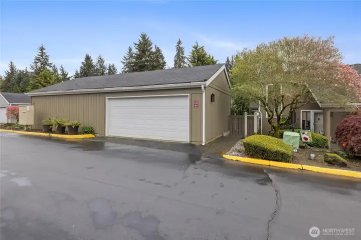 Two car garage with parrallel parking in front of the door
