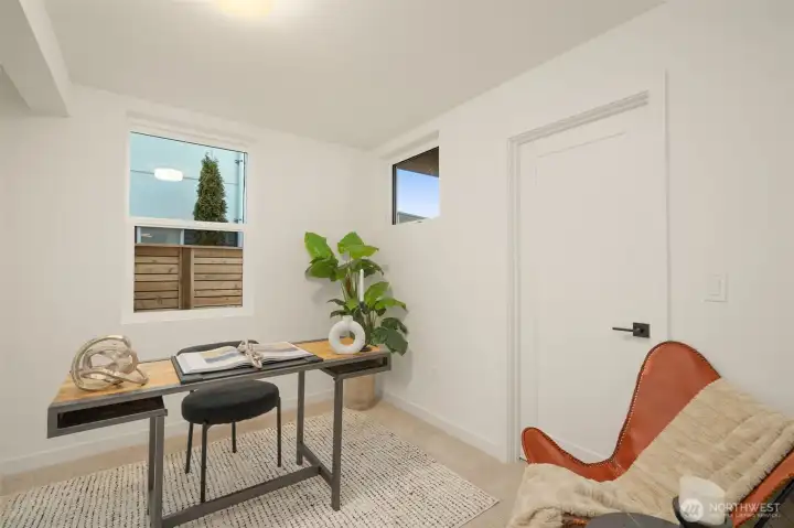 A flex space can be utlizied as a home office, hobby room, or an additonal bedroom. Conveniently located on the ground level.