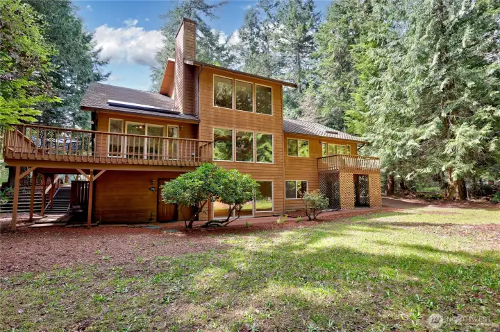 The home can provide single level living but also includes a loft with bathroom and a full lower level including second kitchen area.
