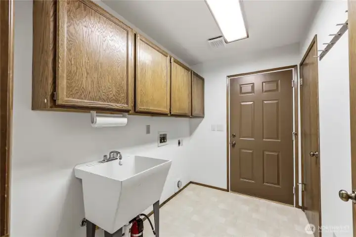 Laundry room off the hall leads to attached 2-car garage.