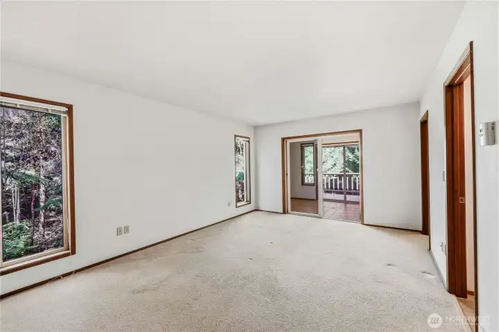 Primary bedroom at the end of the hall.