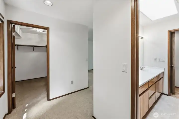 The primary bedroom has two closets, one a walk-in.
