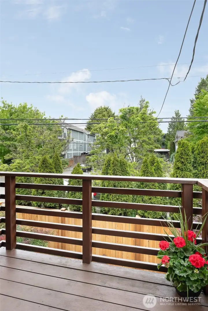 Balcony Deck over looks the patio and garden from main floor