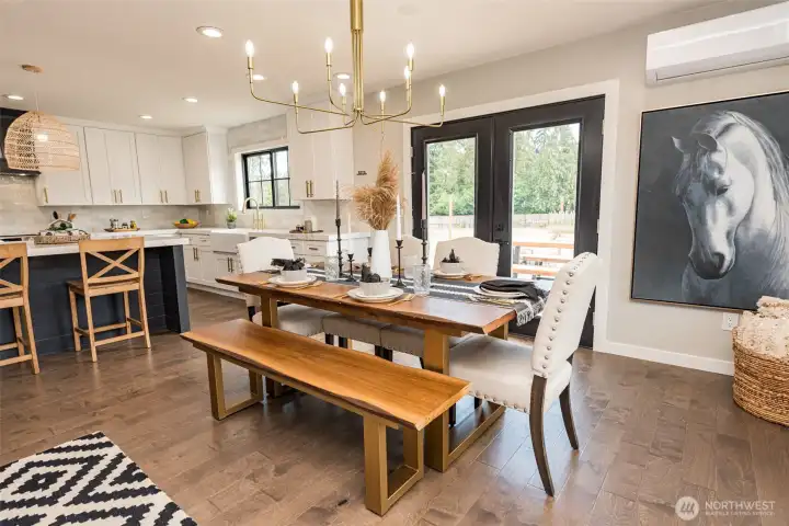 DINING ROOM WITH FRENCH DOORS TO SIDE DECK