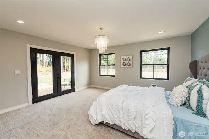 GUEST BEDROOM WITH FRENCH DOORS TO DECK
