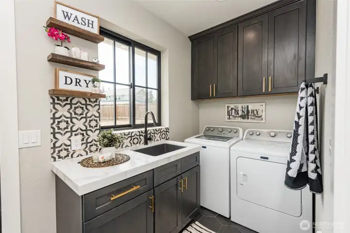 LAUNDRY ROOM WITH OUTSIDE ACCESS DOOR