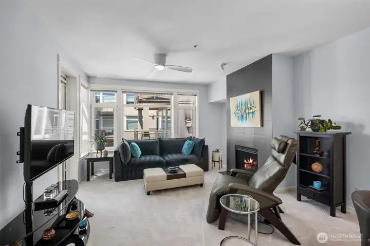Enjoy water views from the living area by the new gas fireplace.