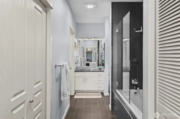 The primary connects to your remodeled bathroom w heated tile floor and large soaking tub.