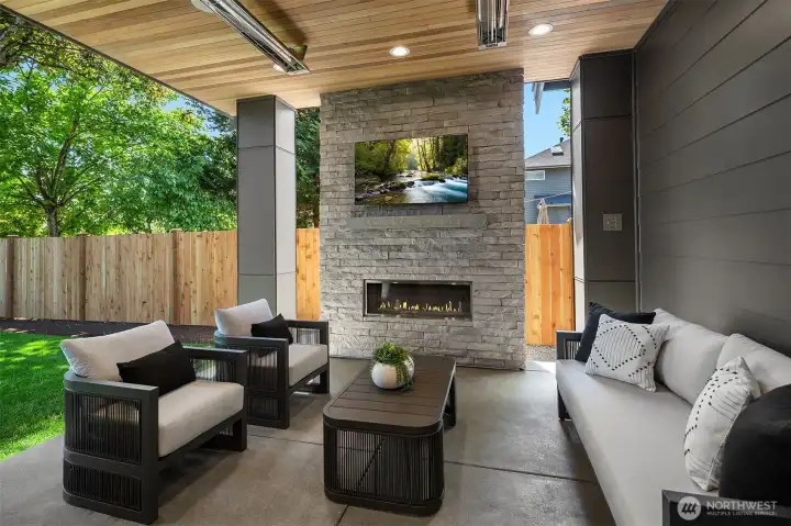 Outdoor covered living area with fireplace Outdoor covered living area with fireplace