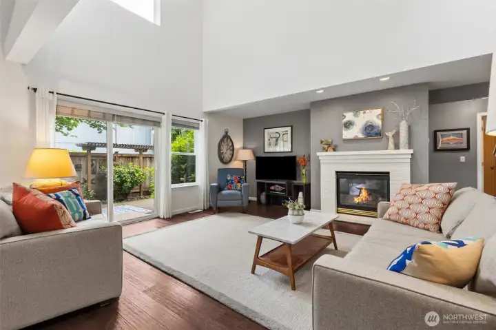 The large, open great room design with wide sliders to the courtyard beyond, offers open spaces and gorgeous rich-tone bamboo flooring to highlight many furnishing arrangements and styles. The large, open great room design with wide sliders to the courtyard beyond, offers open spaces and gorgeous rich-tone bamboo flooring to highlight many furnishing arrangements and styles.
