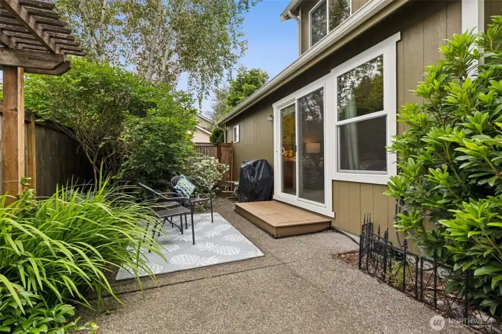 The long patio extends all the way to the back of the lot with a garden gate access to the alley and exterior of garage. Plenty of space for a grill, patio dining set, and "astro turf" area or grow a lawn for FIdo. The long patio extends all the way to the back of the lot with a garden gate access to the alley and exterior of garage. Plenty of space for a grill, patio dining set, and "astro turf" area or grow a lawn for FIdo.