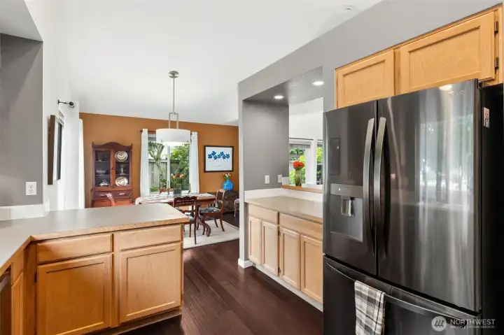 This smart kitchen is tucked in but not tucked away and invites an open flow for daily activity and multiple cooks in the kitchen. This smart kitchen is tucked in but not tucked away and invites an open flow for daily activity and multiple cooks in the kitchen.