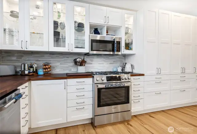 Break away from the conventional and check out this fully renovated kitchen including new appliances (4—drawer refrigerator, microwave, dishwasher and 5-burner gas stove with warmer and so many hot features, Martha Stewart would be envious!