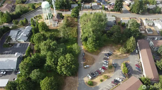 Drone photo of site. South adjacent to water tower - all the open area including dirt car park.